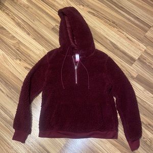 Sherpa that has a quarter zip and pockets